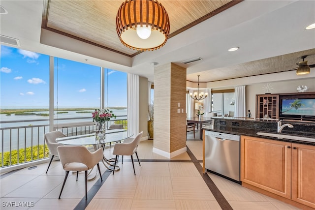 kitchen featuring pendant lighting, a water view, wooden ceiling, dark stone countertops, and dishwasher