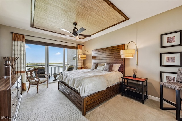 carpeted bedroom with access to exterior and ceiling fan