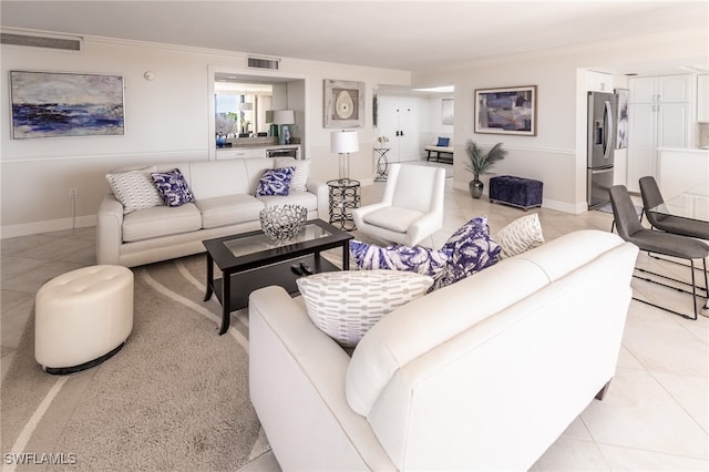 tiled living room featuring crown molding