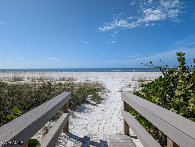 property view of water with a beach view