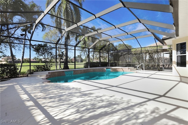 view of pool featuring a patio and a lanai