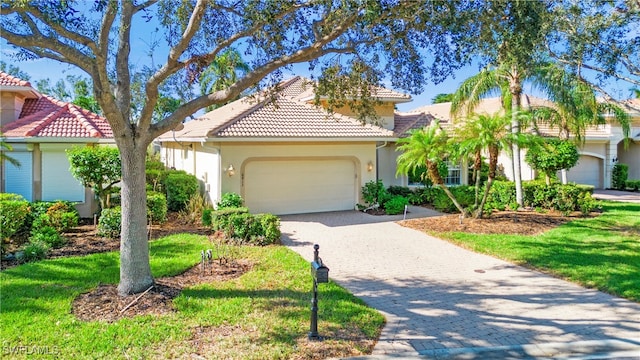 mediterranean / spanish-style home featuring a garage