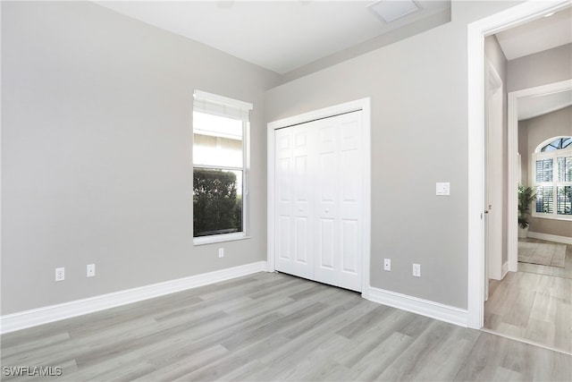 unfurnished bedroom with light hardwood / wood-style flooring