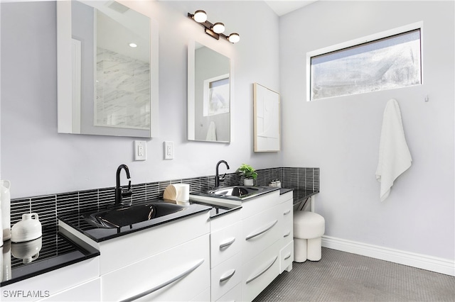 bathroom featuring tile patterned floors and vanity