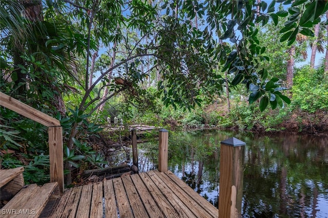 view of dock featuring a water view