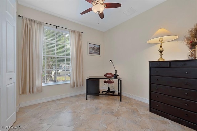 interior space with ceiling fan and a wealth of natural light