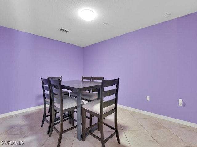 view of tiled dining area