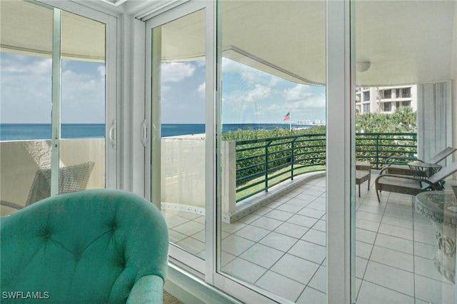 balcony featuring a water view