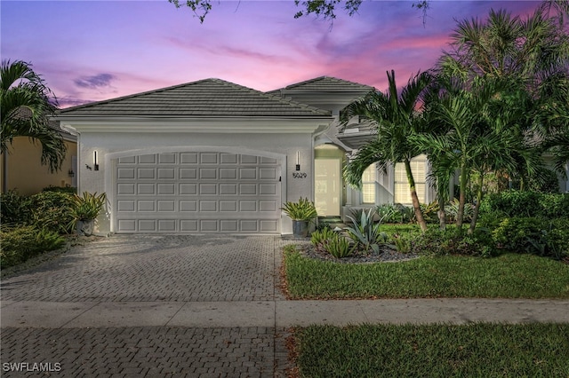 view of front of property featuring a garage