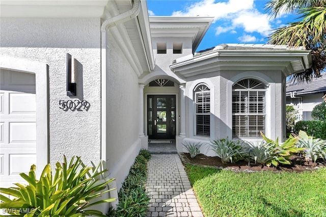 property entrance with a garage