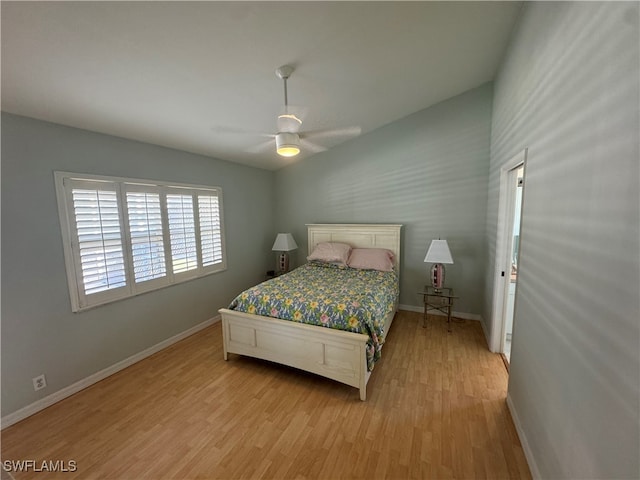 bedroom featuring light wood-type flooring and ceiling fan