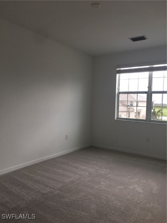 view of carpeted spare room