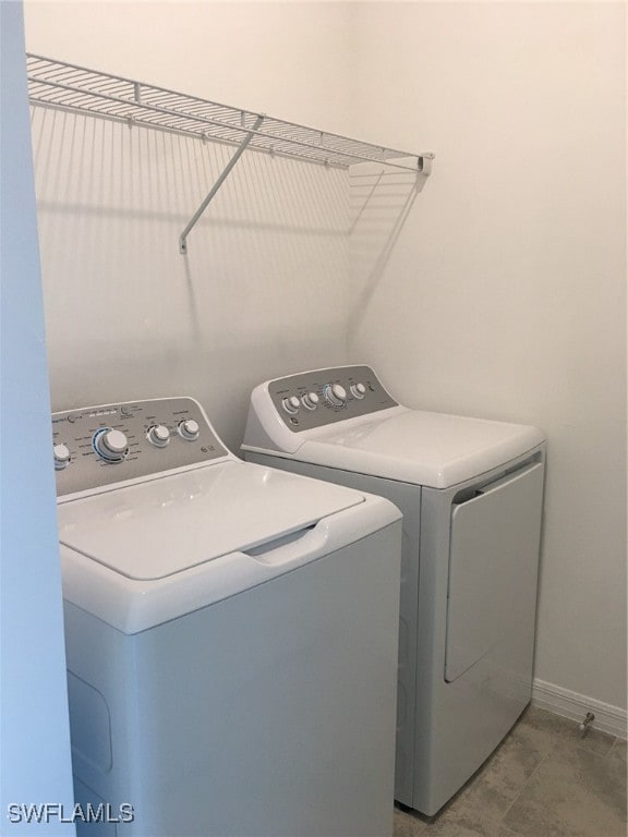 laundry area featuring separate washer and dryer