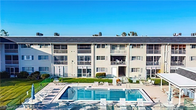 view of pool featuring a patio