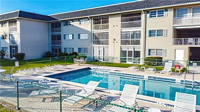 view of pool featuring a patio