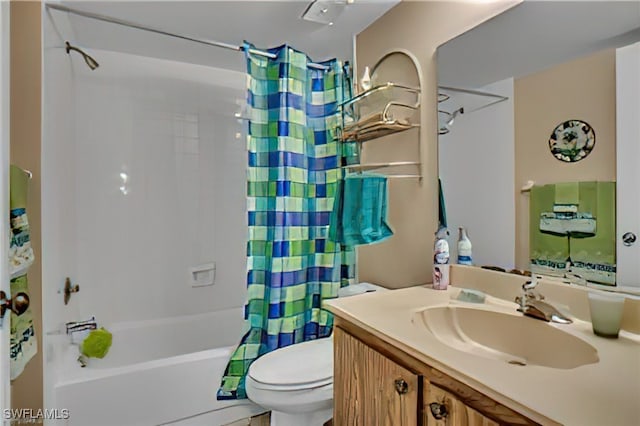 full bathroom with vanity, toilet, and shower / bath combo with shower curtain