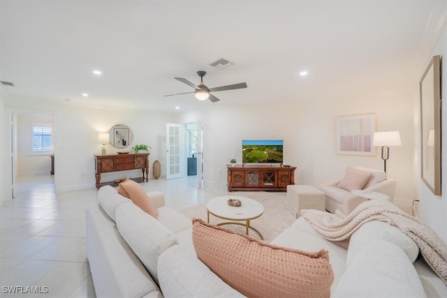 living room with a ceiling fan, recessed lighting, visible vents, and light tile patterned floors