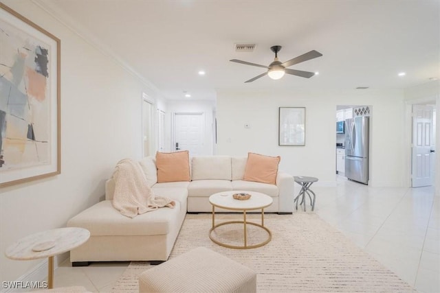 living room with light tile patterned floors, recessed lighting, visible vents, a ceiling fan, and baseboards