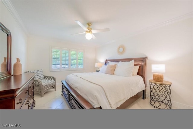 bedroom featuring light tile patterned floors, crown molding, baseboards, and ceiling fan