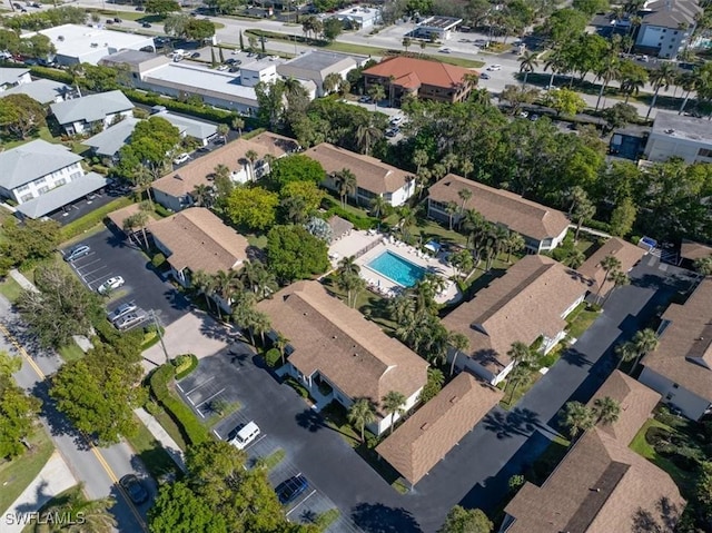 birds eye view of property with a residential view