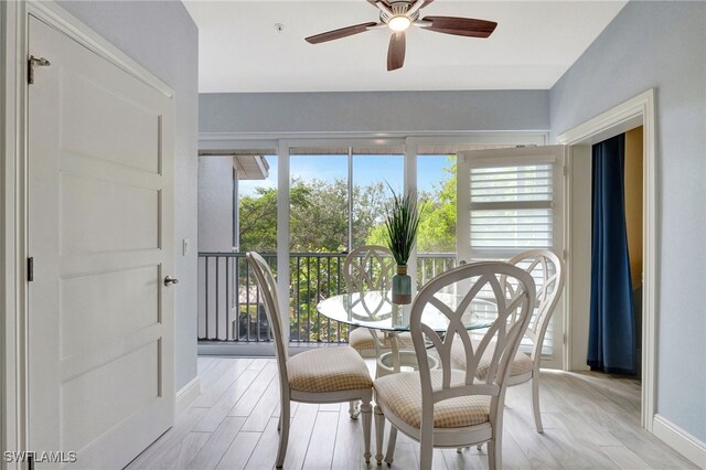 dining room with a wealth of natural light and ceiling fan