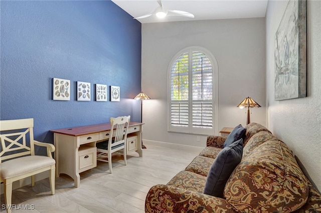 office area with ceiling fan