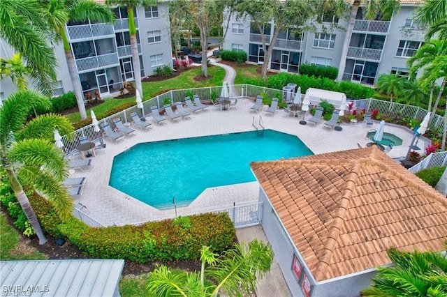 view of swimming pool featuring a patio