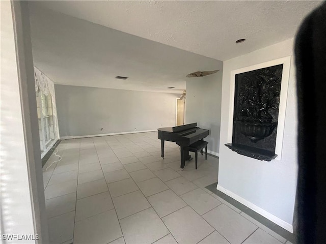 interior space featuring a textured ceiling