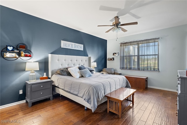 bedroom featuring ceiling fan and hardwood / wood-style floors