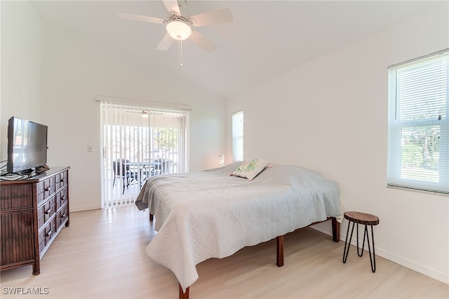 bedroom featuring light wood-type flooring, multiple windows, and ceiling fan