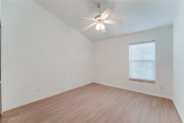 spare room featuring light hardwood / wood-style flooring and ceiling fan