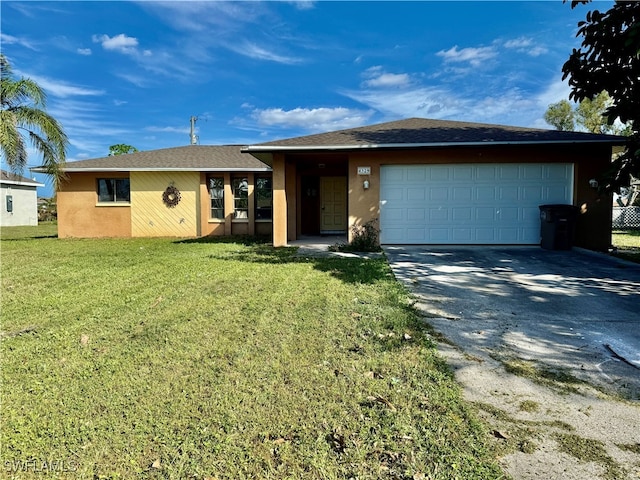 ranch-style home with a front yard and a garage