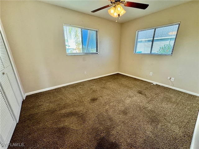 interior space featuring ceiling fan