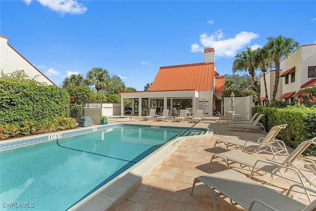 view of pool with a patio