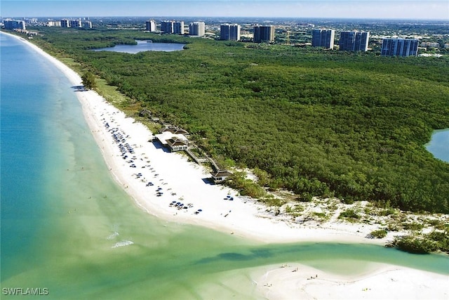 aerial view featuring a view of the beach and a water view