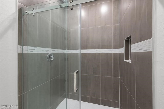 bathroom with an enclosed shower