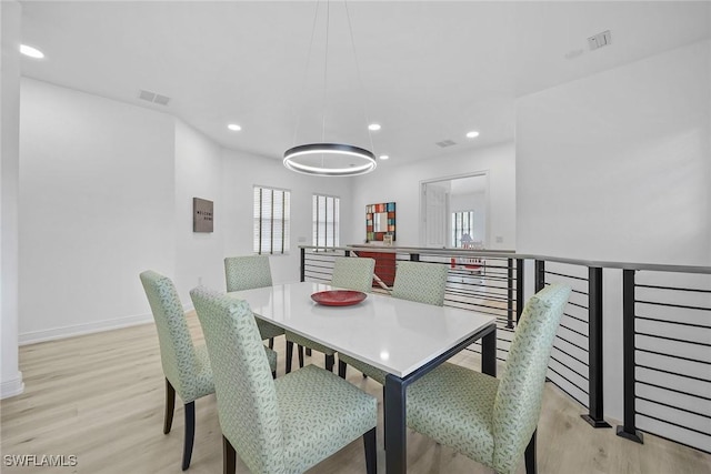 dining area featuring light hardwood / wood-style floors