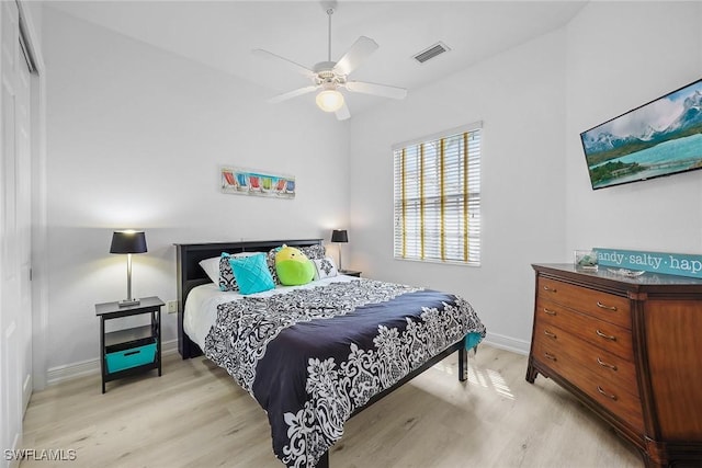 bedroom featuring light hardwood / wood-style flooring and ceiling fan