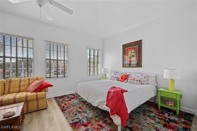 bedroom featuring ceiling fan and hardwood / wood-style floors