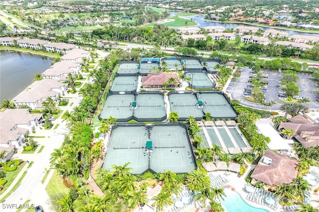 birds eye view of property featuring a water view