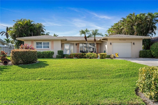 ranch-style home with a front yard and a garage