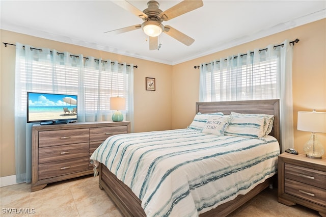 bedroom with ceiling fan and ornamental molding