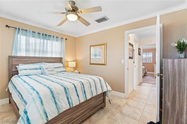 tiled bedroom with multiple windows, ceiling fan, and ornamental molding