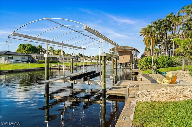 view of dock with a water view