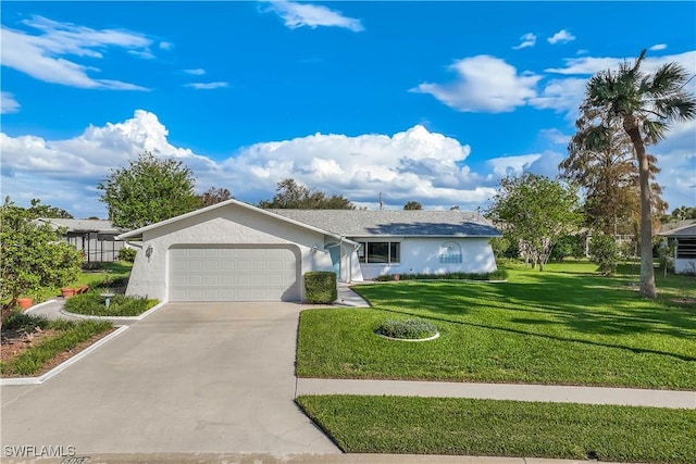 view of front facade featuring a garage and a front lawn