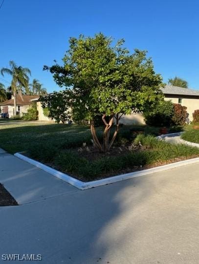 exterior space featuring a front lawn