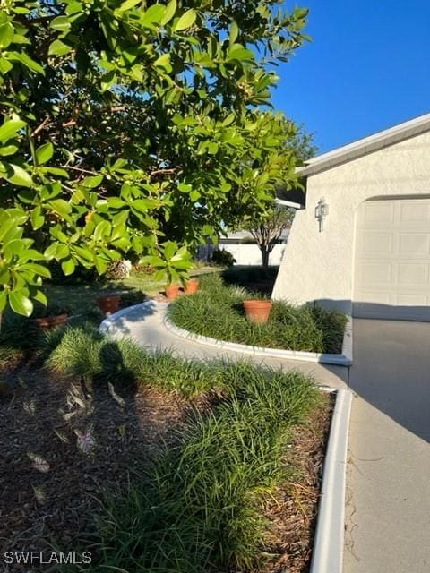 view of yard with a garage