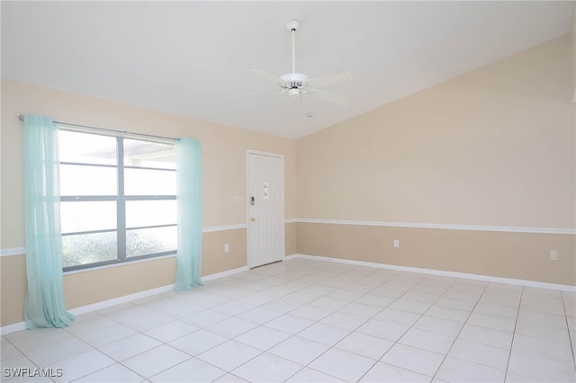 unfurnished room with ceiling fan and light tile patterned floors