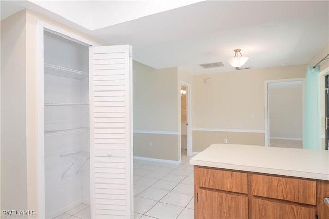 kitchen featuring light tile patterned floors