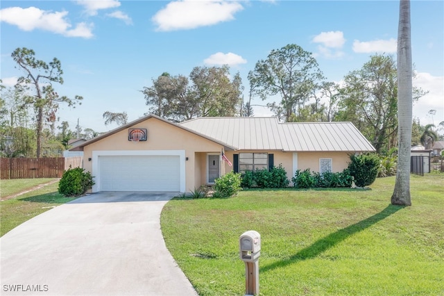 single story home with a garage and a front lawn